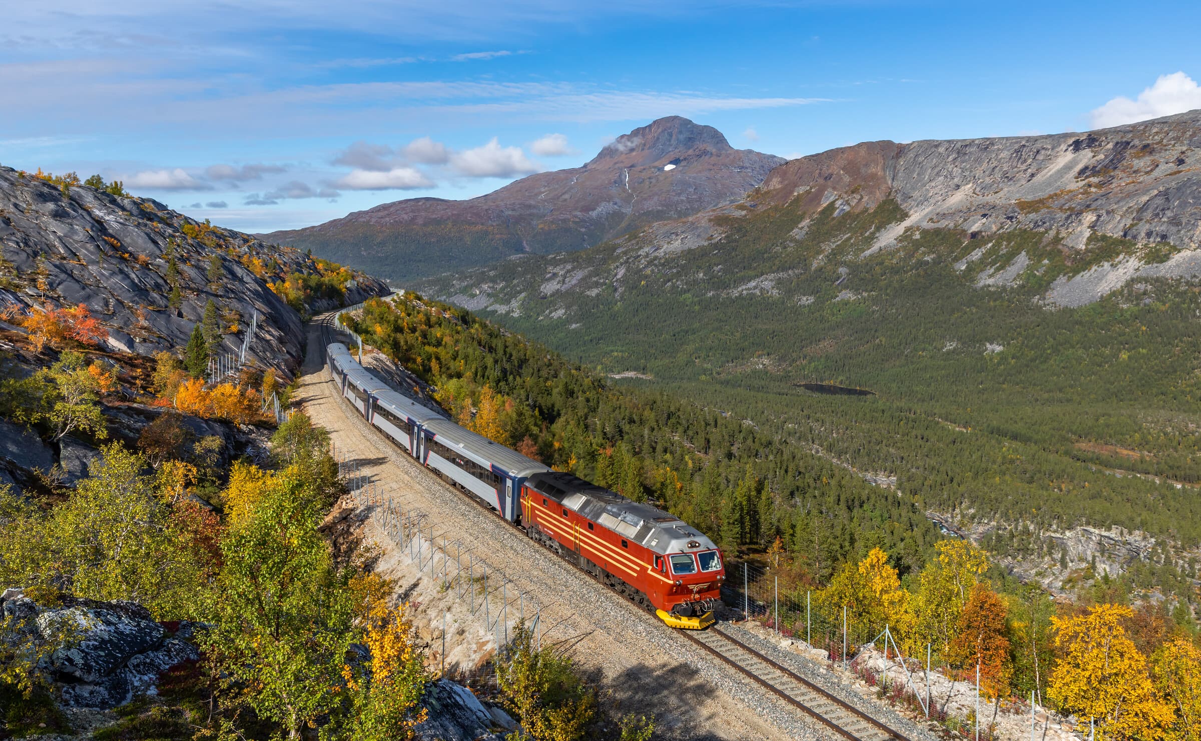 The Nordland railway crossing an autumn mountain landscape near Bodø