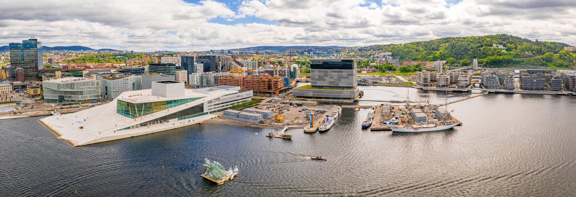 Oslo Opera House and Bjørvika waterfront at dusk, Norway