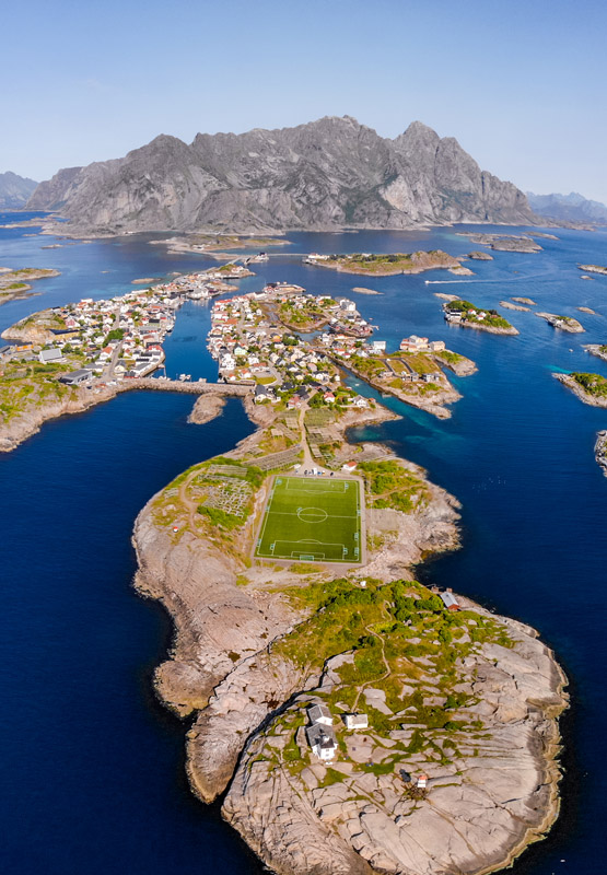 Henningsvær archipelago with multiple small islands connected by bridges and fishing village buildings